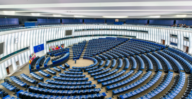 Picture of European parliament with chairs in a half circle