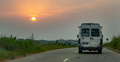 Van driving on a remote road