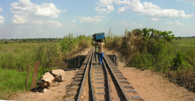 Porters on train tracks near Lwizi, Katanga, Democratic Republic of Congo