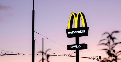 large McDonalds sign against sunset sky