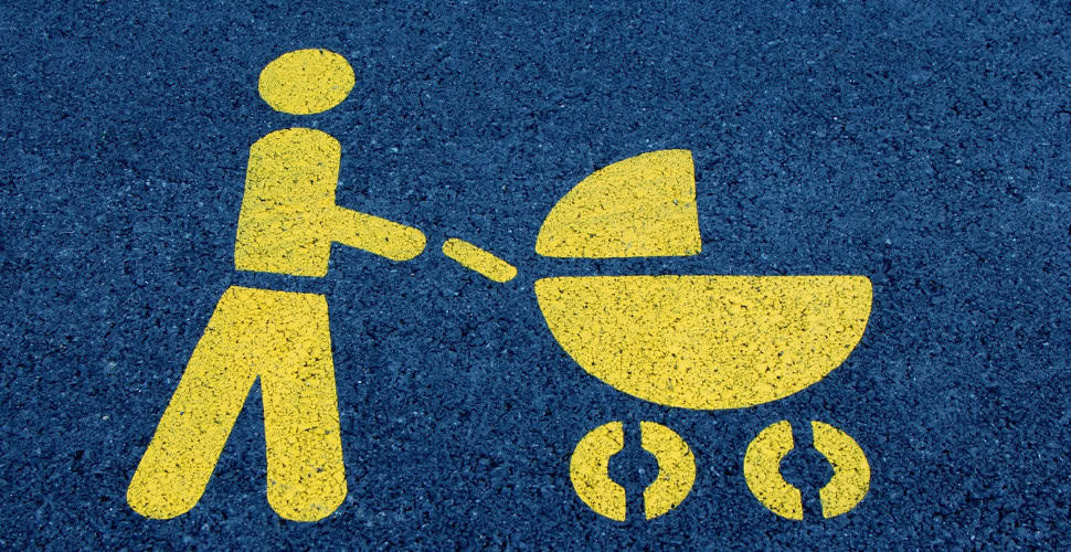 sign of person pushing baby stroller