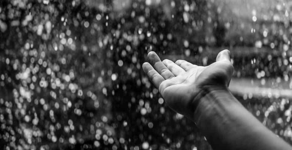 hand reaching out in desperation