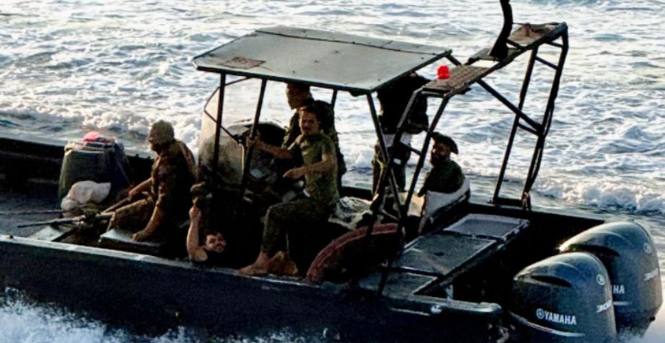 Libyan militias take migrants out to sea and throw them in
