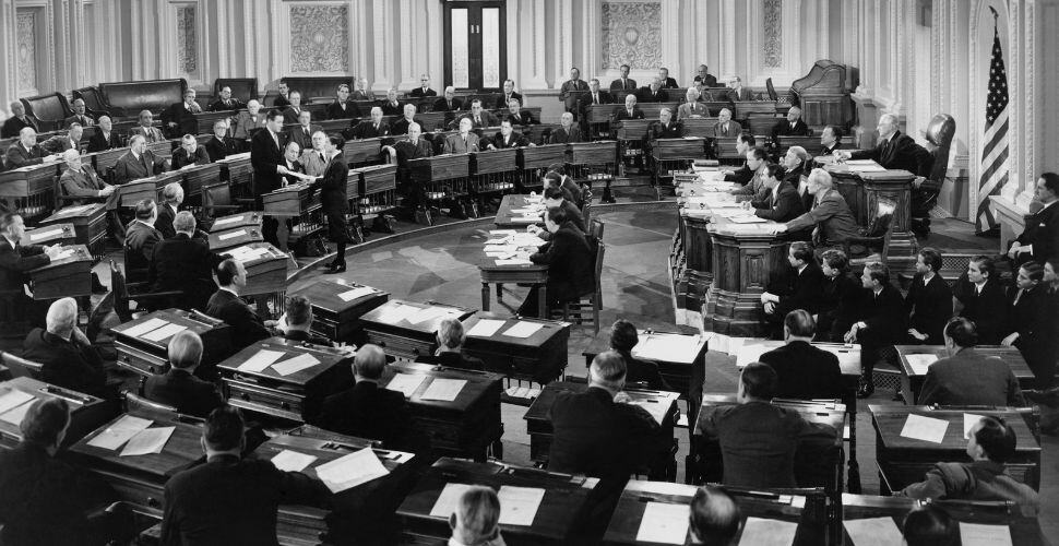 Vintage photograph in black and white of people in a court of law