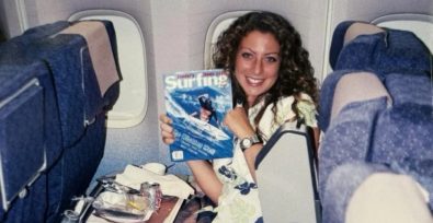 Rachel Louw, Al Fayed trafficking survivor, holding a Surfing magazine on a plane
